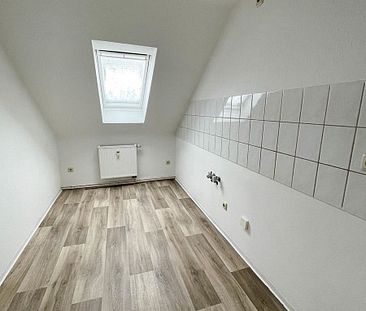 Neue Fußböden! Gemütliche Dachgeschosswohnung in ruhiger Lage von Aue - Foto 3