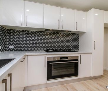 Family Comfort in a Quiet Glenmore Park Cul-de-sac - Photo 2