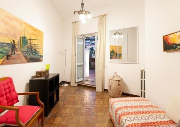 Attic-Monti: 1-6 month rentals. Spacious, furnished 3 Bedroom, 2 bath, living room, dining room, study and large panoramic terrace. Bright, silent, located in well kept Palazzo d’Epoca with elevator and doorman. Near transport and Metro.