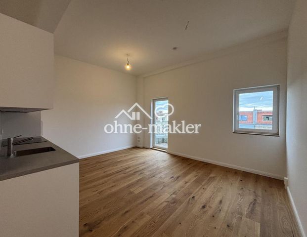 Moderne Neubau-Dachgeschosswohnung in unmittelbarer Nähe zur Schloßstraße - Foto 1