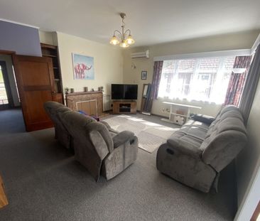 Bright 2-Bedroom Home in Wakari - Photo 1