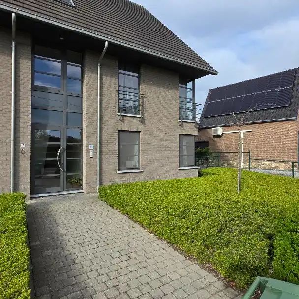 Ruim gelijkvloers appartement met tuin en garage - Photo 1