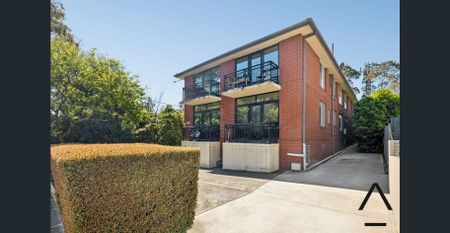 Leafy Top-Floor Haven with Dual Balconies and Modern Comfort - Photo 2
