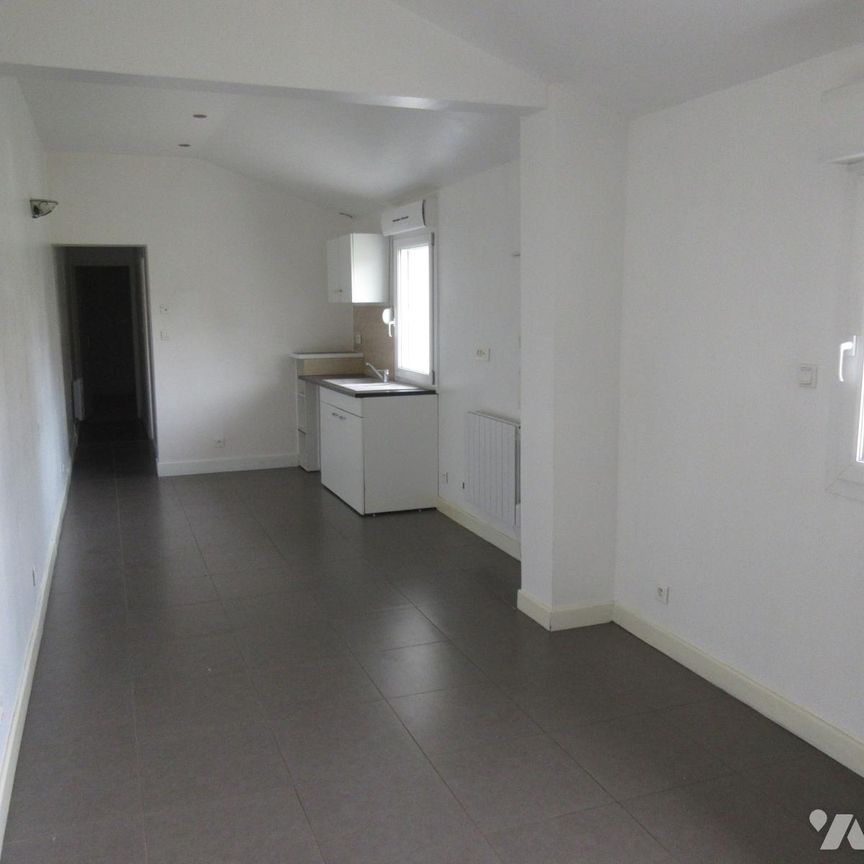 maison TYPE II de plain-pied - Photo 1