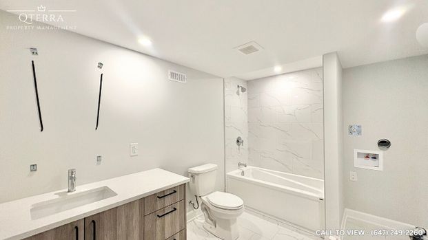 MODERN 2-BEDROOM BASEMENT APARTMENT WITH BEAUTIFUL FEATURES - Photo 1