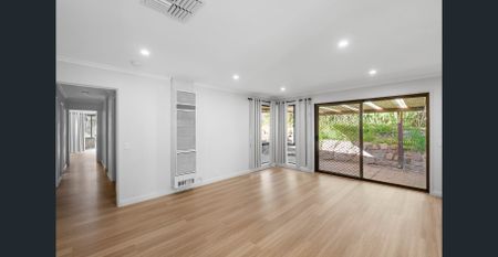 Freshly Renovated Family Home in a Quiet Setting - Photo 2