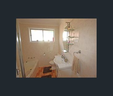 Well-Maintained Three-Bedroom Home - Photo 4