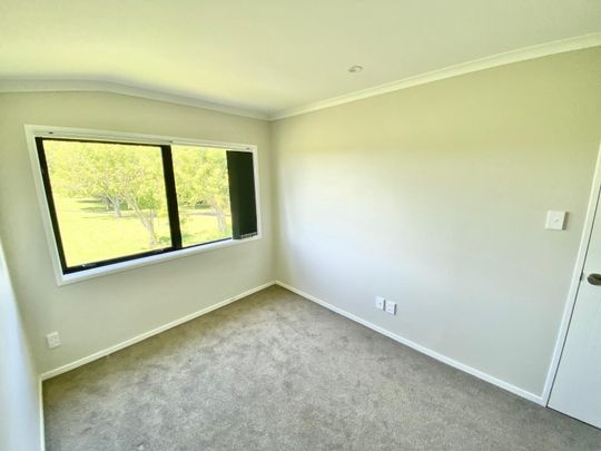 Elevated, Secure Living by the Park - Photo 1