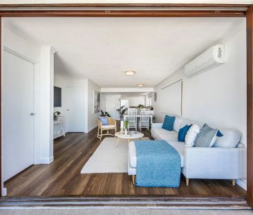 Elevated Coastal Apartment Living - Photo 2