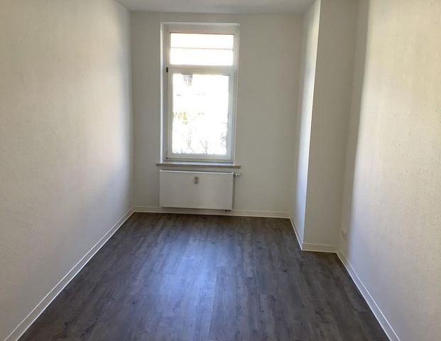 Dreiraumwohnung mit Balkon und Einbauküche - Foto 1