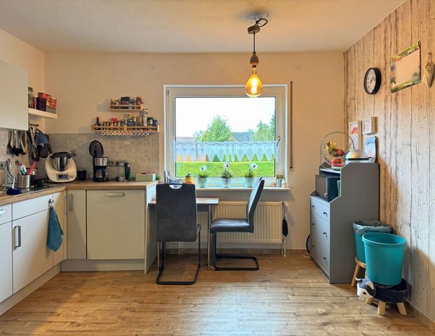 Gepflegte Doppelhaushälfte mit Garten, Garage & Carport in absolut zentraler Lage von Ostgroßefehn - Foto 1