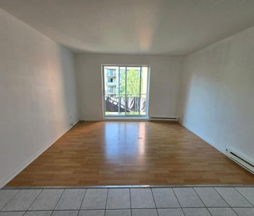 BEAU 4 1/2 LIBRE AU 1ER JUILLET DELSON RIVE SUD - Photo 1