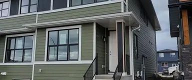 Brand New 3 Bedroom Duplex with Flex & Bonus rooms and Garage in Rockland Park | Calgary - Photo 1