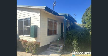 Freshly Renovated Three-Bedroom Home - Photo 3