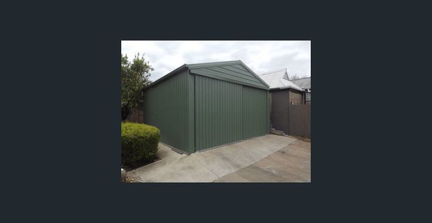 DELIGHTFUL TWO BEDROOM RESIDENCE WITH LARGE DOUBLE GARAGE AND PRIVATE LEAFY GARDEN. - Photo 1