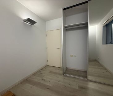 Modern 2-Bedroom City Apartment with Balcony and Pool Access - Photo 1