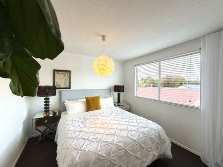 Walk to Everything! Tidy Central 2-Bedroom Unit - Photo 2