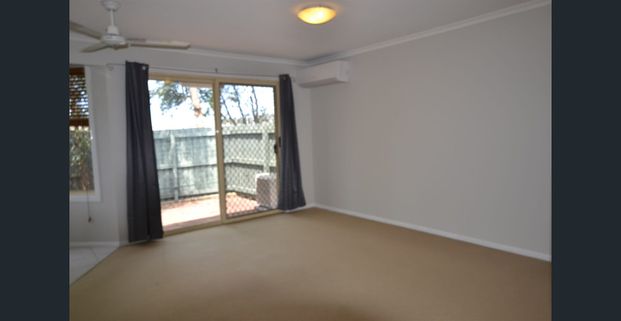 This comfortable 2-bedroom townhouse is in a perfect location - Photo 1
