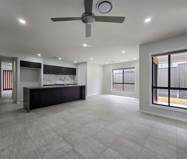 Spacious Family Living with Multiple Living Zones & Alfresco Entert... - Photo 4