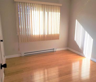 N-Rosemont Grand 4 1/2 Triplex 2e Étage près de tous les services - Photo 1