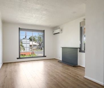Neat and Tidy Three Bedroom Home! - Photo 1