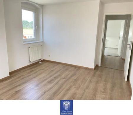 Zum Wohlfühlen! Individuelle Dachgeschosswohnung mit moderner EBK! - Photo 4