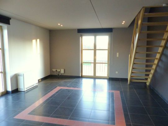 Duplex-app. met 2 slpk., terras en garage in Herk-de-Stad. - Photo 1