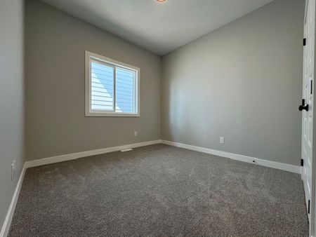 Brand New 3 Bedroom Upper Unit in Rosewood - Photo 3