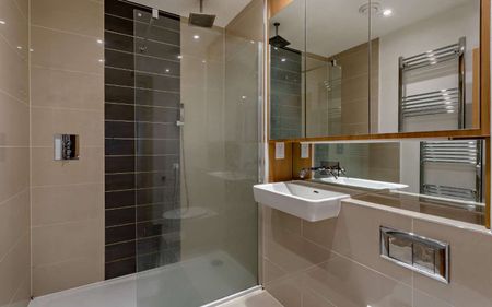 A well presented two-bedroom, two-bathroom duplex apartment with parking. - Photo 4