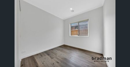 Contemporary 4-Bedroom Home in the Heart of Beveridge - Photo 4