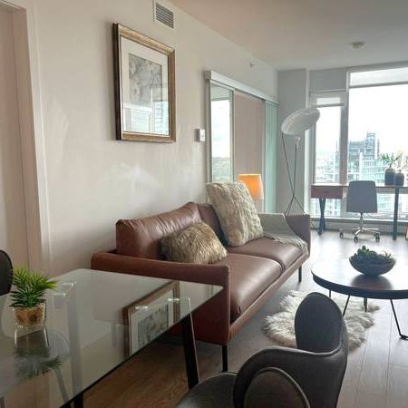 Fully Furnished Luxury Condo 2bed 2 baths + Den - Photo 1