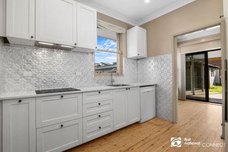 Renovated Family Living with Exceptional Garaging - Photo 4