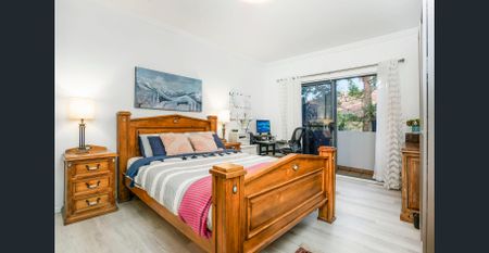 Spacious Three-Bedroom Apartment in the Heart of Castle Hill - Photo 4