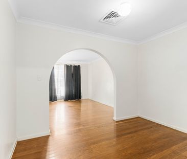 FRESHLY PAINTED 4 BEDROOM HOME IN IDEAL LOCATION - Photo 1