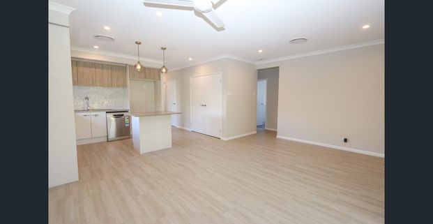 Gorgeous Family Home within Benowa State High School Catchment - Photo 1