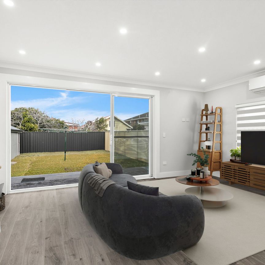 Easy Modern Living in Prized Beachside Pocket - Photo 1