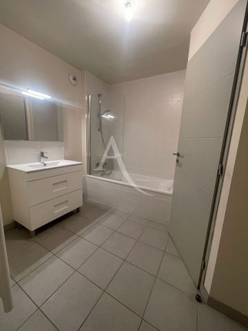 Location Appartement 4 pièces 94m² - Photo 3