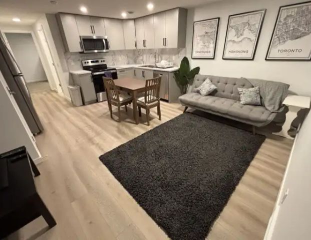 Fully furnished with high speed Internet 2 Bed 1 Bath Legal Bsmt Suite MAHOGANY | Calgary - Photo 1