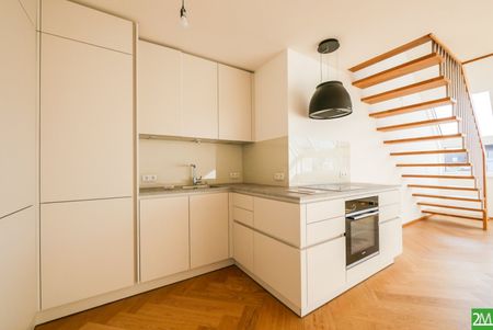 Klimatisierte DG-Maisonette mit toller Dachterrasse und eigenem Garagenplatz - Photo 2