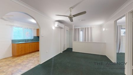 This well presented high set 2 bedroom residence offers low maintenance living in a convenient location! - Photo 2