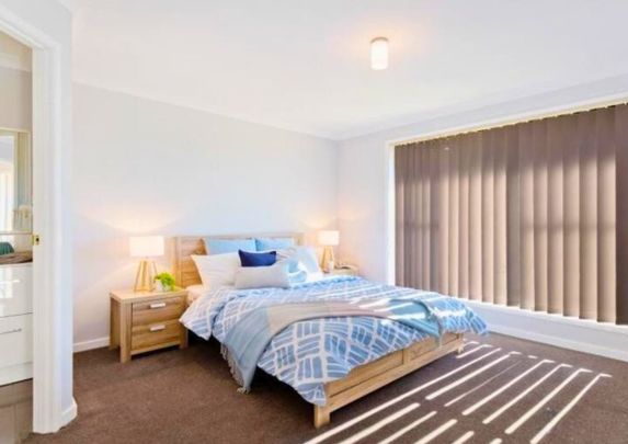 Stylish Four-Bedroom Home with Space for Everyone - Photo 1