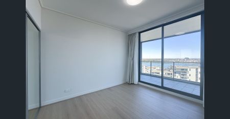 Luxury Apartment with Spectacular Water Views | Top Floor of Complex - Photo 2