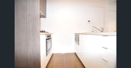 Brilliantly Positioned Two Bedroom with Expansive Living Spaces! - Photo 3