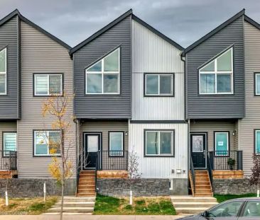 Brand New Townhome 4-Bed, 3-Bath Home with Garage in Cornerbrook NE... - Photo 1