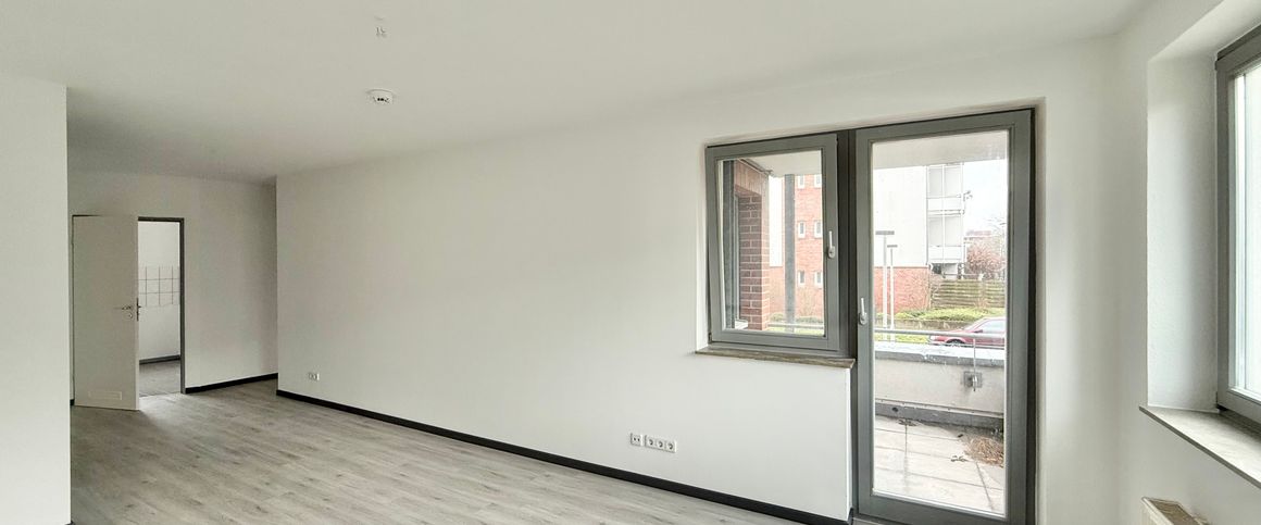 Schöne 3-Zimmer-Erdgeschosswohnung mit Balkon in zentrumsnaher Lage - Foto 1