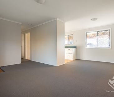Freshly Renovated Home with a Large Fully Fenced Backyard - Photo 2