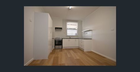 Neat & Freshly Painted 3 bedroom home - Photo 5