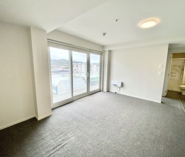 PEAK APARTMENTS - Photo 5