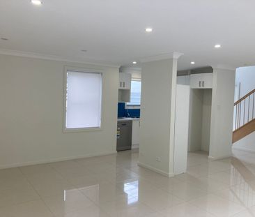 Modern two bedroom unit in sought after location. - Photo 1