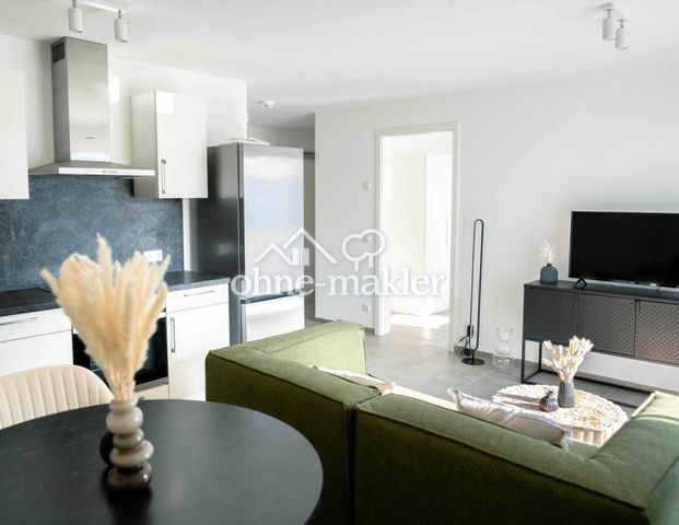 Neuwertige helle 2-Zimmer Wohnung mit sonnigen Balkon im Herzen Grafings - Foto 1